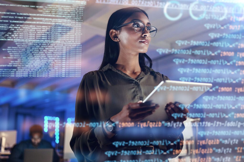 Woman standing in front of code