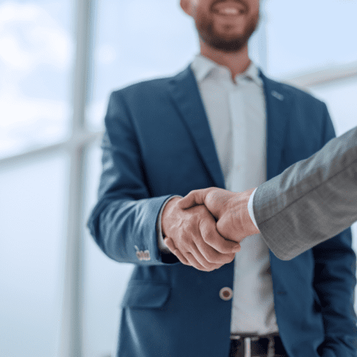 business partners shaking hands concept of partnership