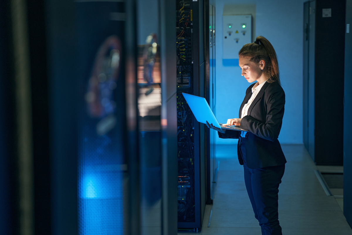 woman using daas in server room